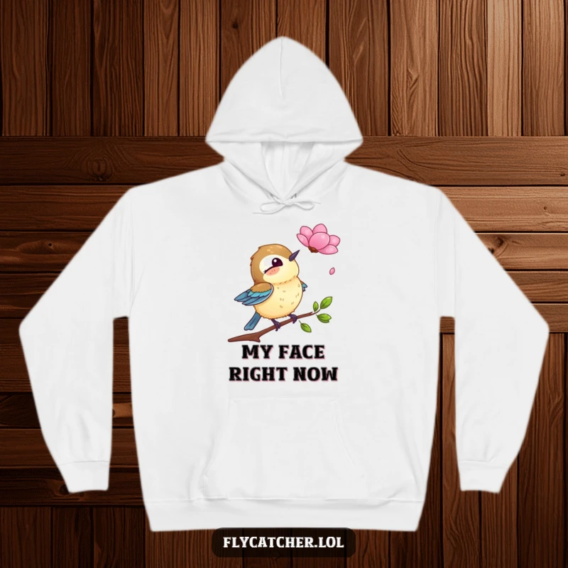 Funny hoodie displaying a flycatcher bird in a state of comical surprise as a single petal descends towards it.
